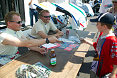 JJ Lehto and Johnny Herbert (front) during the autograph session