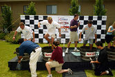  Johnny Herbert, JJ Lehto and Eliseo Salazar participate in a grape stomp competition