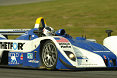 James Weaver makes a flying lap in the Dyson Racing Lola-MG on his way to winning the overall pole