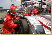 Emanuele Pirro during the tyre change
