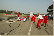 The Audi team celebrates Emanuele Pirro at the finish