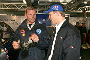 Mattias Ekström (right) explains the Audi A4 DTM to Juha Kankkunen