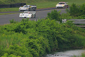 Scenic Lime Rock Park includes a creek near the edge of the track
