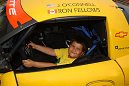 A future racing star checks out the Chevrolet Corvette