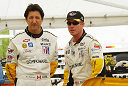 Ron Fellows (left) and Johnny O'Connell discuss set up during a break