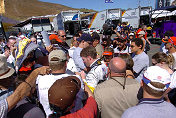 Media crowds around Dale Earnhardt Jr. after his test run in the Chevrolet Corvette
