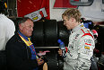 Mattias Ekström in talk with a tyre engineer