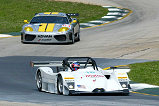 The Essex Racing Lola-Millington Prototype (front) leads the ACEMCO Ferrari 360 Modena through Road Atlanta's "S" turns during Tuesday's American Le Mans Series testing session.