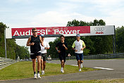Audi Sport Japan Team Goh's drivers jogging around the track