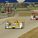 Tom Kristensen leads Emanuele Pirro in the early stages of the race