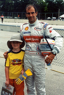 Emanuele Pirro with his young fan Tyler, at the Road America 500, 7 July 2002
