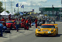The #3 Chevrolet Corvette of Ron Fellows and Johnny O'Connell emerges from the pits ahead of the Prodrive Ferraris