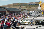 Crowded paddock during ALMS driver autograph session