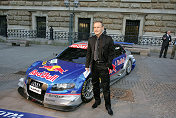 TV presenter Reinhold Beckmann in front of the Audi A4 DTM