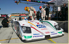 Frank Biela gives the #2 ADT Champion Audi R8 to Emanuele Pirro